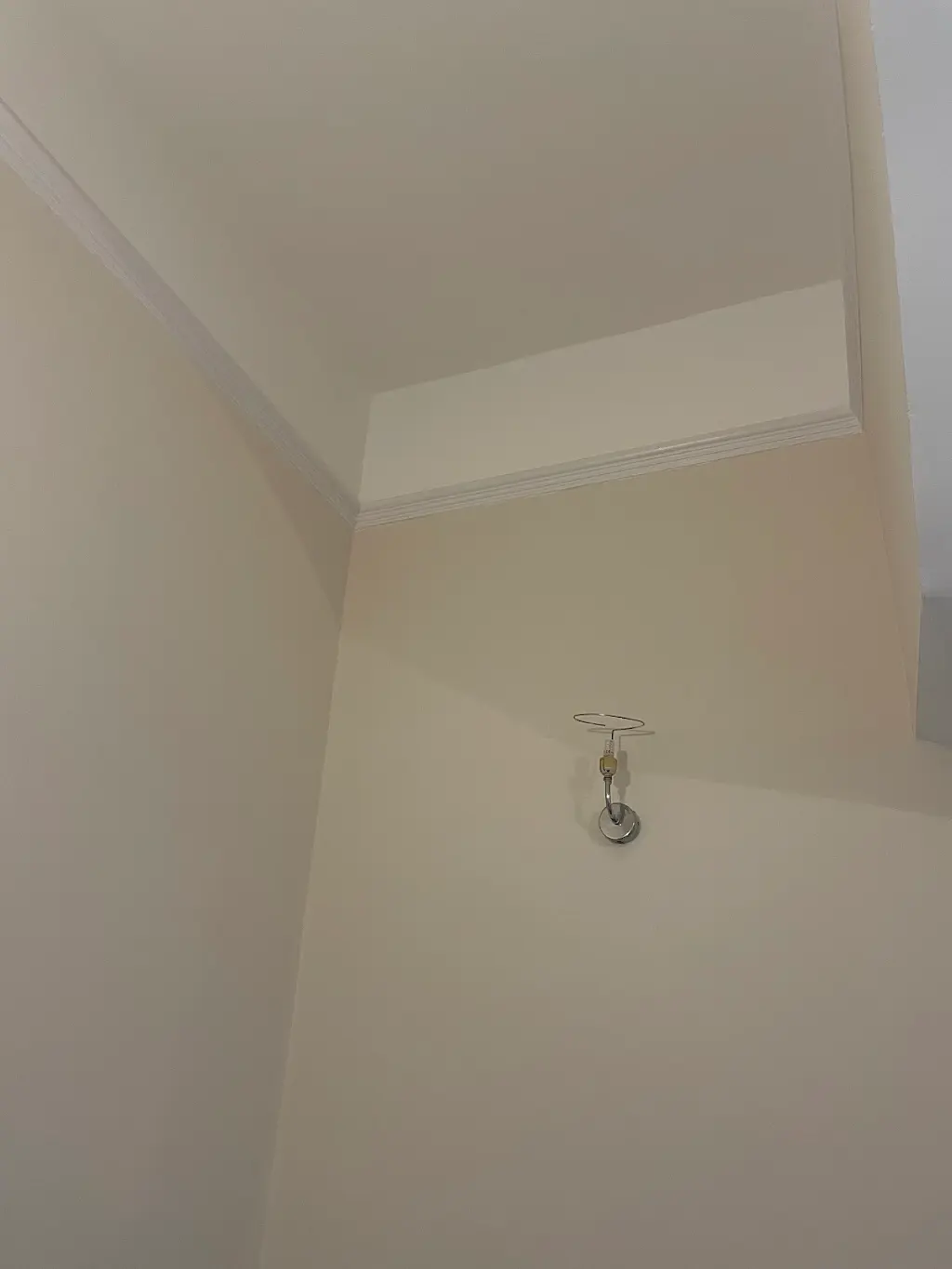 After — Peeling wallpaper stripped back to sound plaster, Living room · Hampton Hill